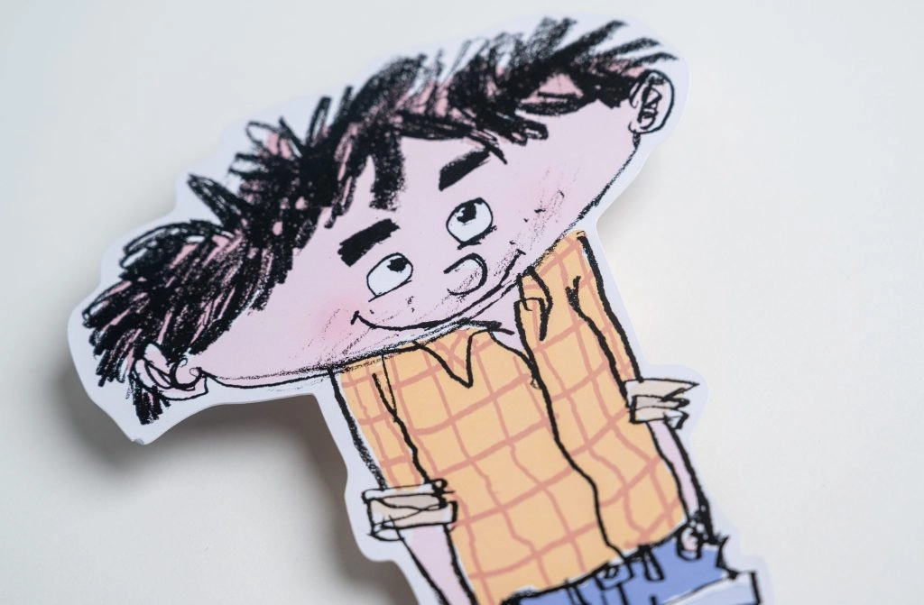 Udskåret trykt illustration af en tegnet figur